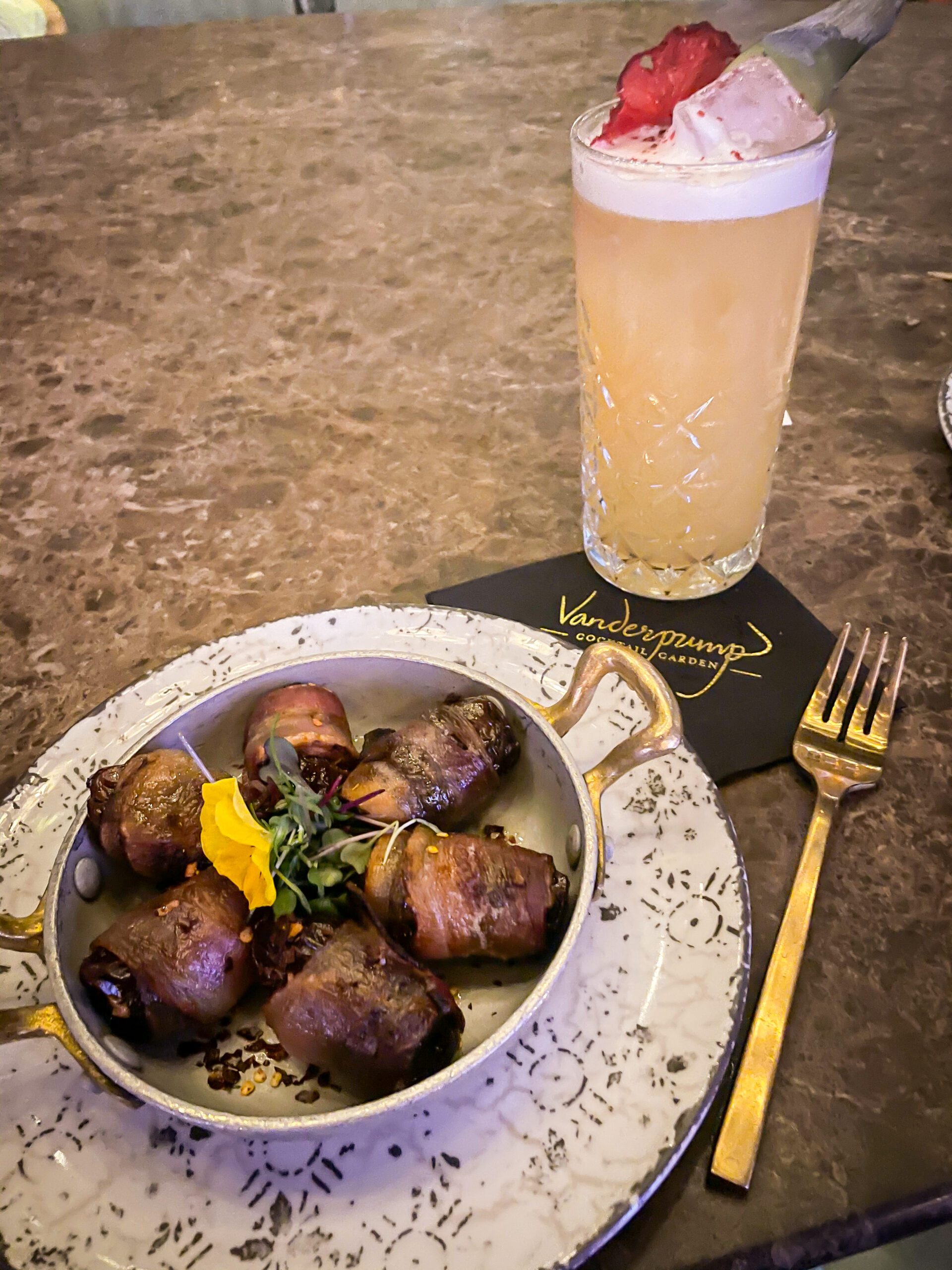 Bacon-Covered Dates and Cocktail at Vanderpump Cocktail Garden inside Caesar's Palace Resort in Las Vegas. 