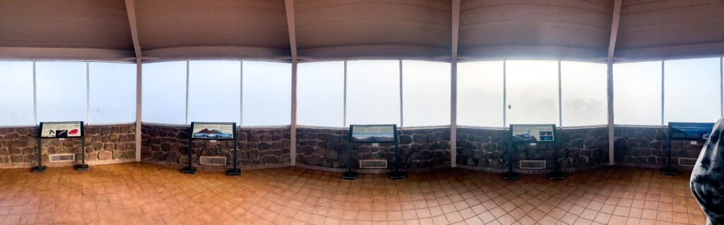 View from inside the covered view point at the summit of Haleakala. Best things to do in Maui on a budget. 