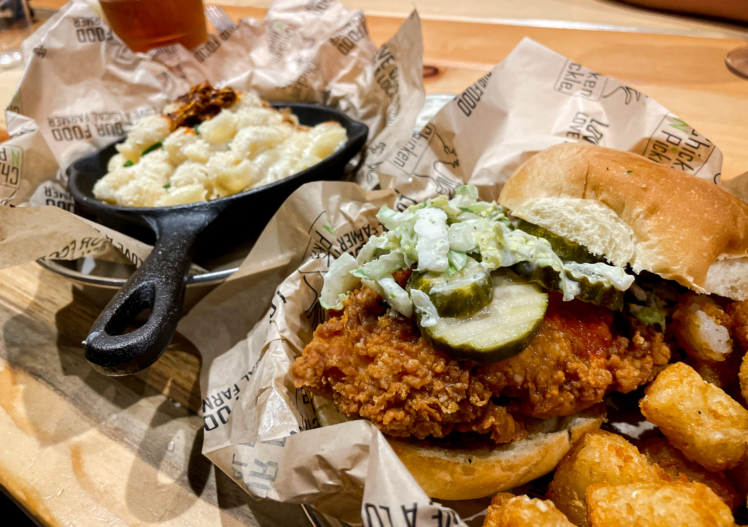 Elote Mac and cheese and fried chicken sandwich from Chicken and Pickle restaurant in San Antonio