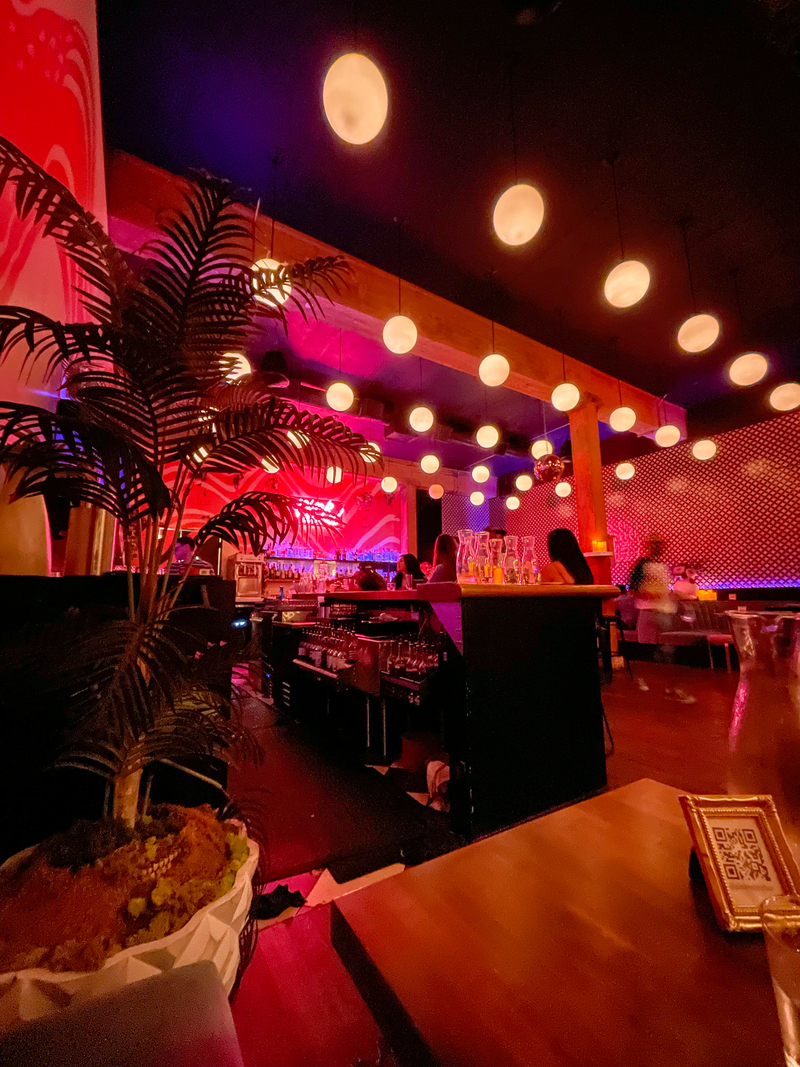 Pink Rabbit Bar dining room with lights in Portland