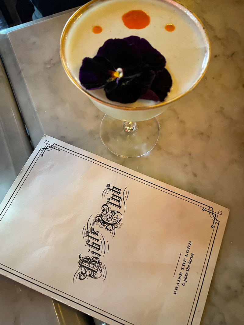 Cocktail with Flower and Bible Club Menu in Portland