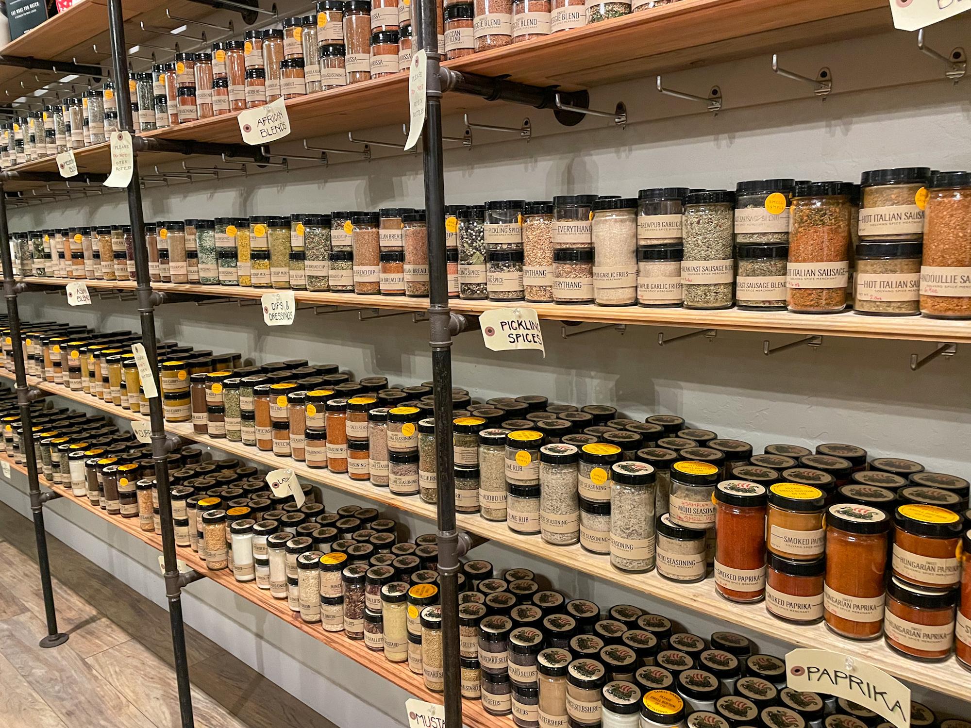 Shelves full of spices from the Solvang Spice Merchant