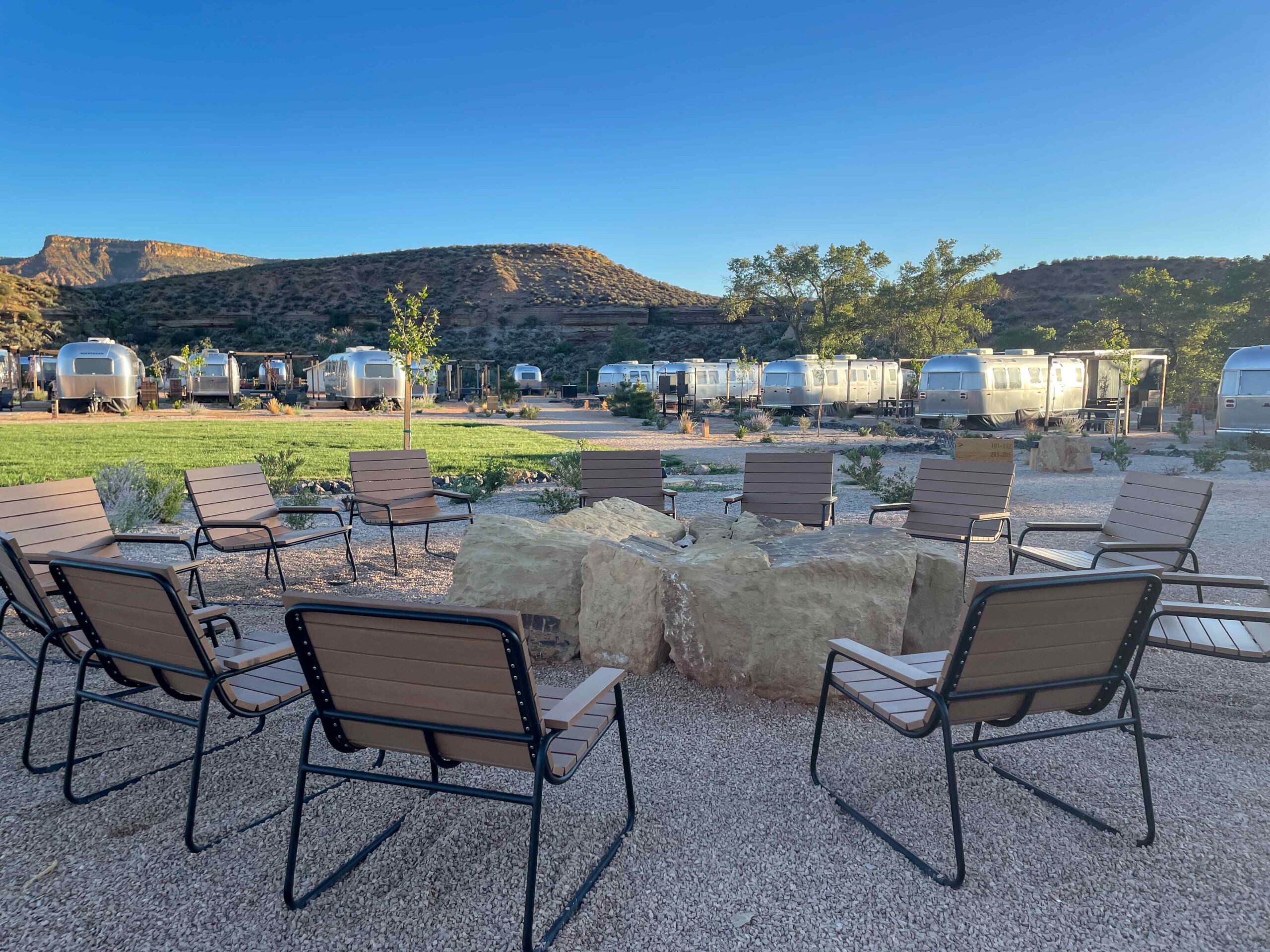 Main fire pit and sitting area with Airstreams in the background at Autocamp Zion